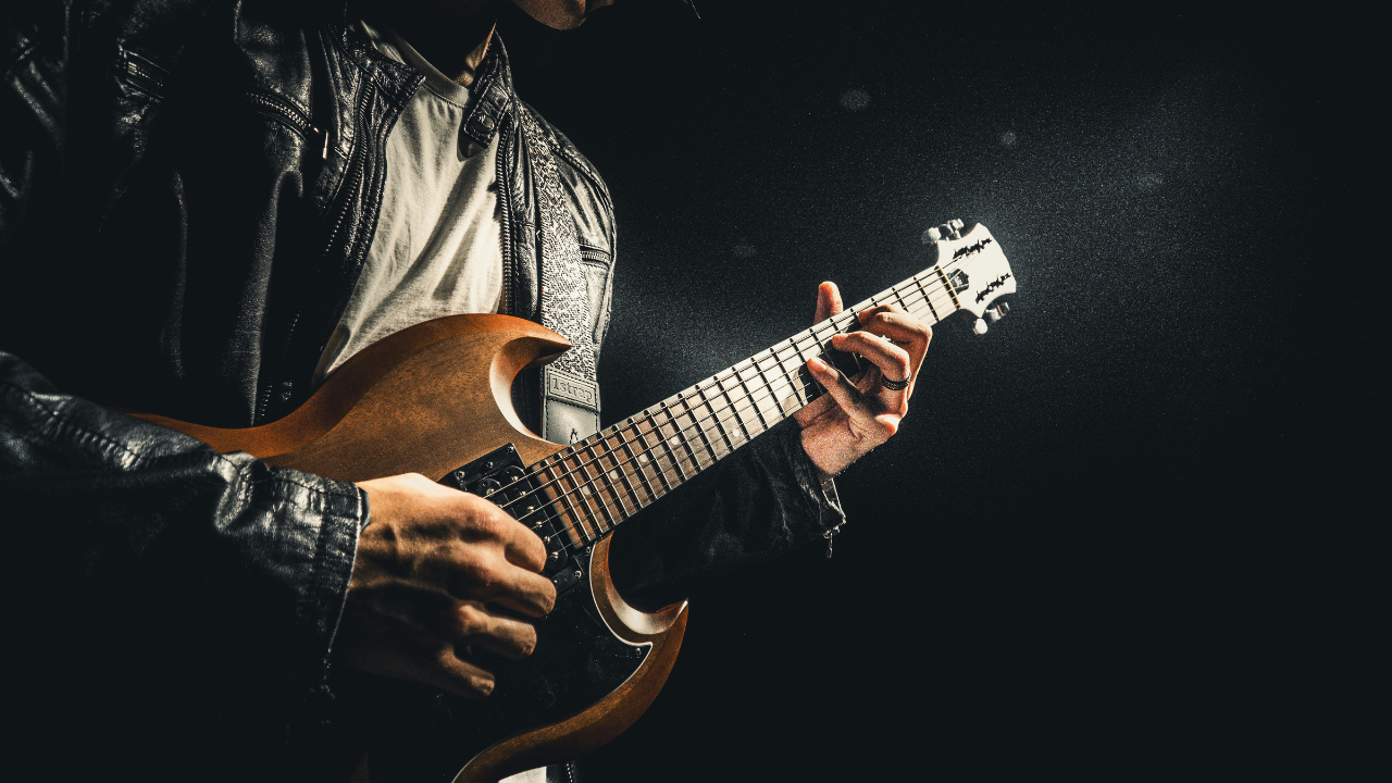 man playing guitar