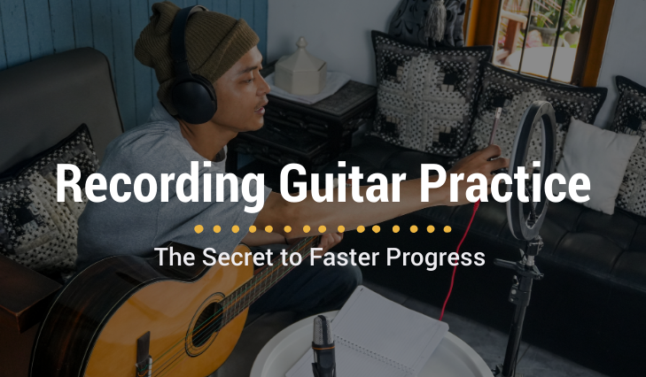 Man recording guitar practice at home