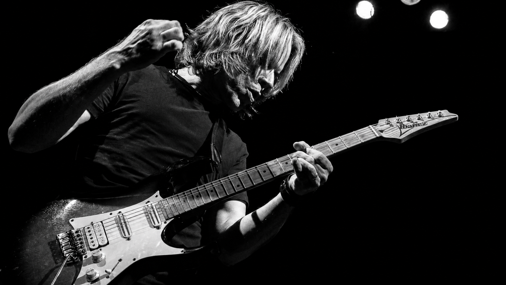 rock guitarist performing on stage