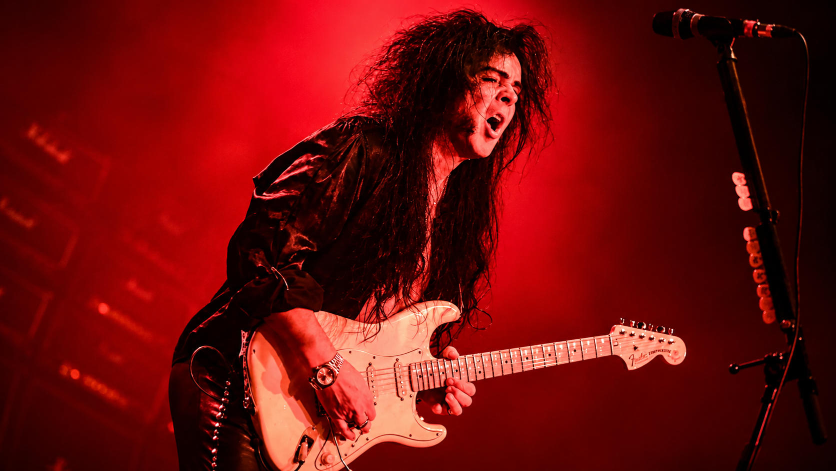 rock guitarist performing on stage