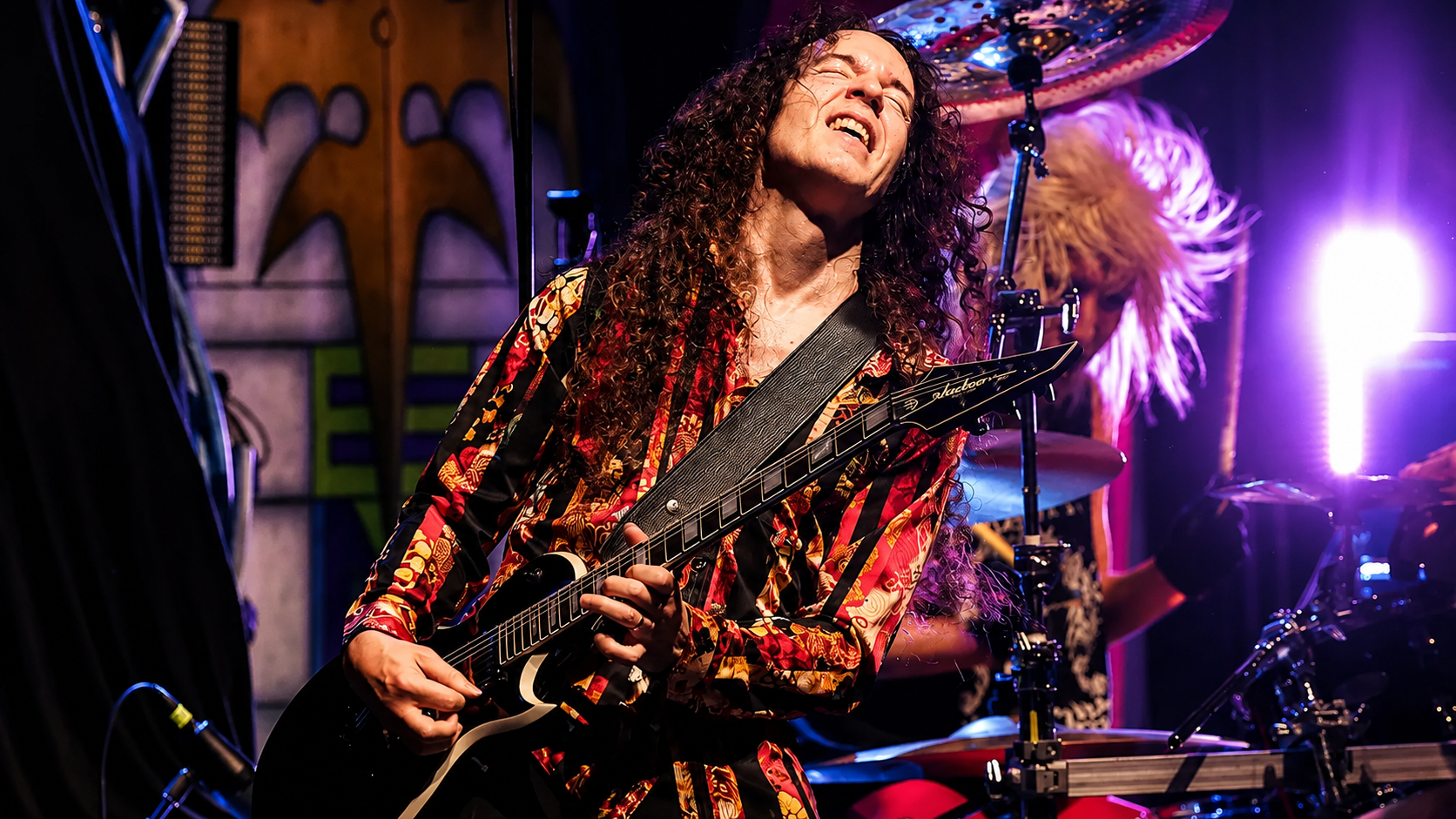 rock guitarist performing on stage