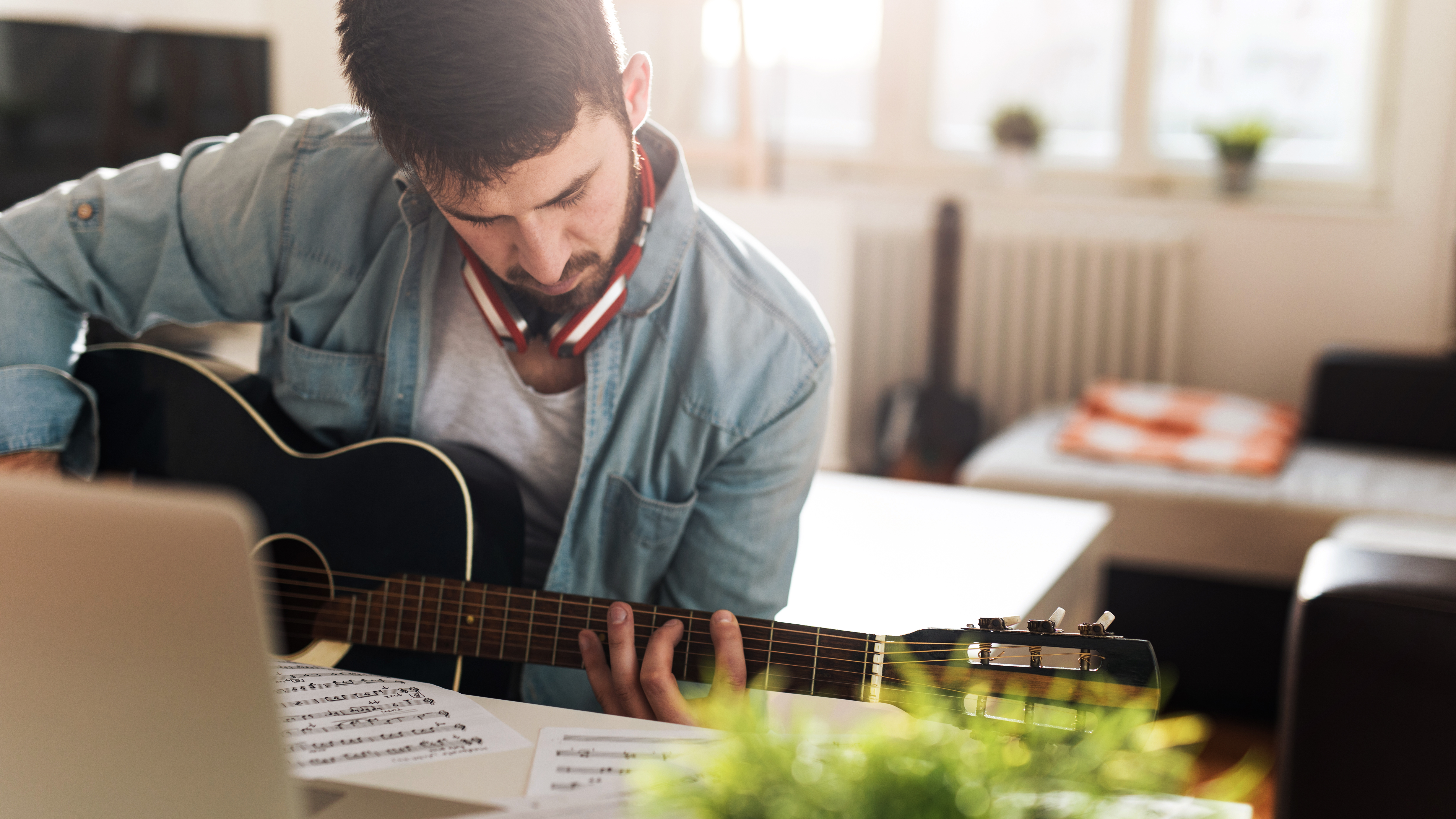 practicing guitar player